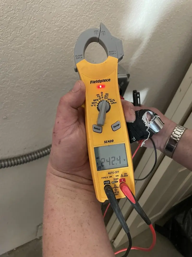 Voltage testing with clamp meter during Hot Tub / Pool Electrical Wiring in South Jacksonville